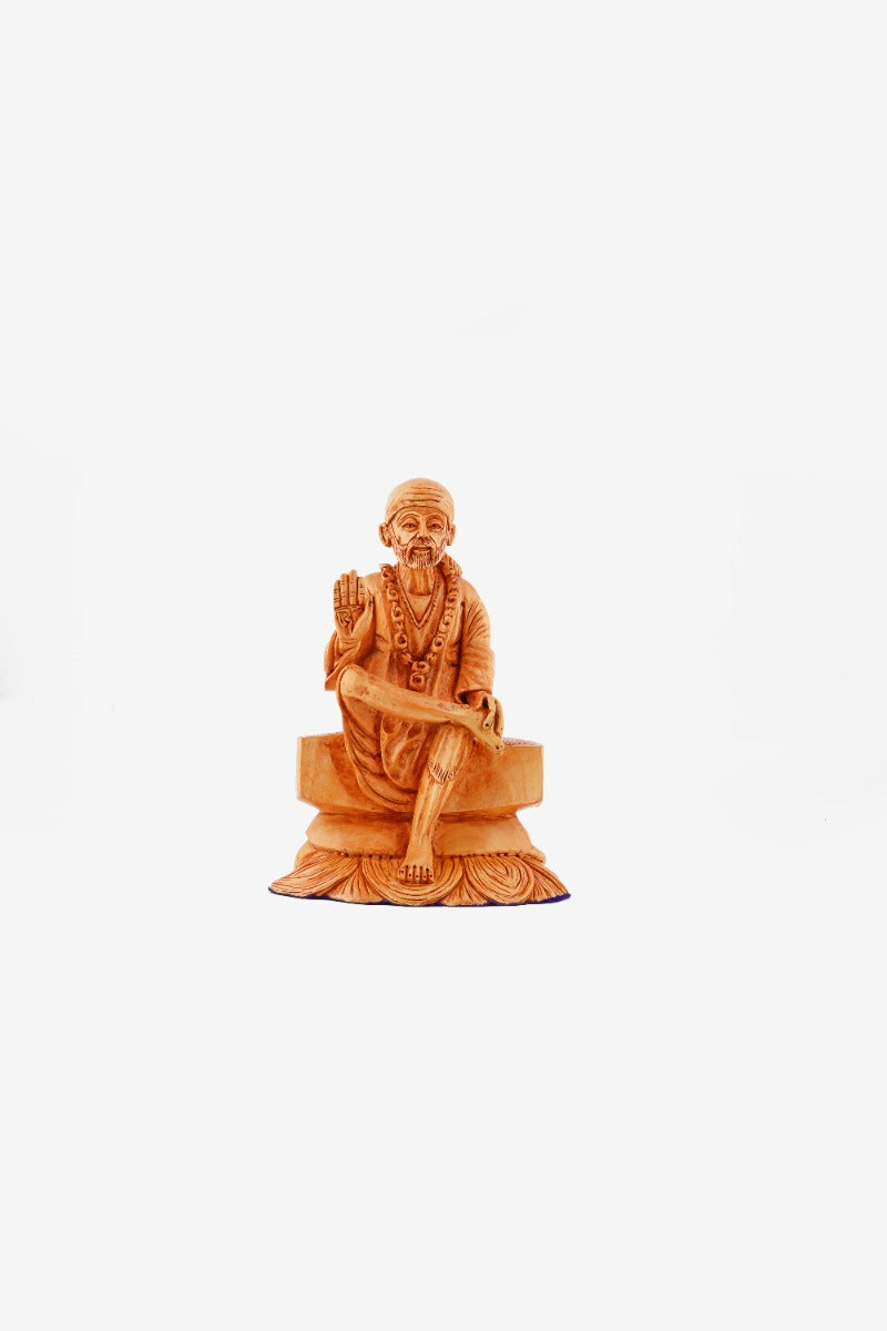 Wooden Figurine of Sai Baba — false
