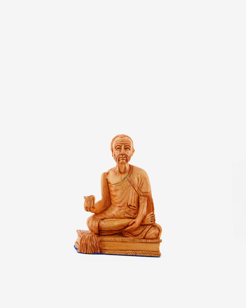 Meditating Saint Hand-Carved Wooden Statue — false