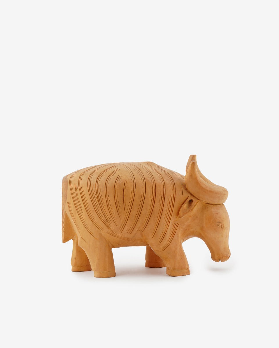 Hand Carved Bull Statue — false