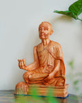 Meditating Saint Hand-Carved Wooden Statue — false