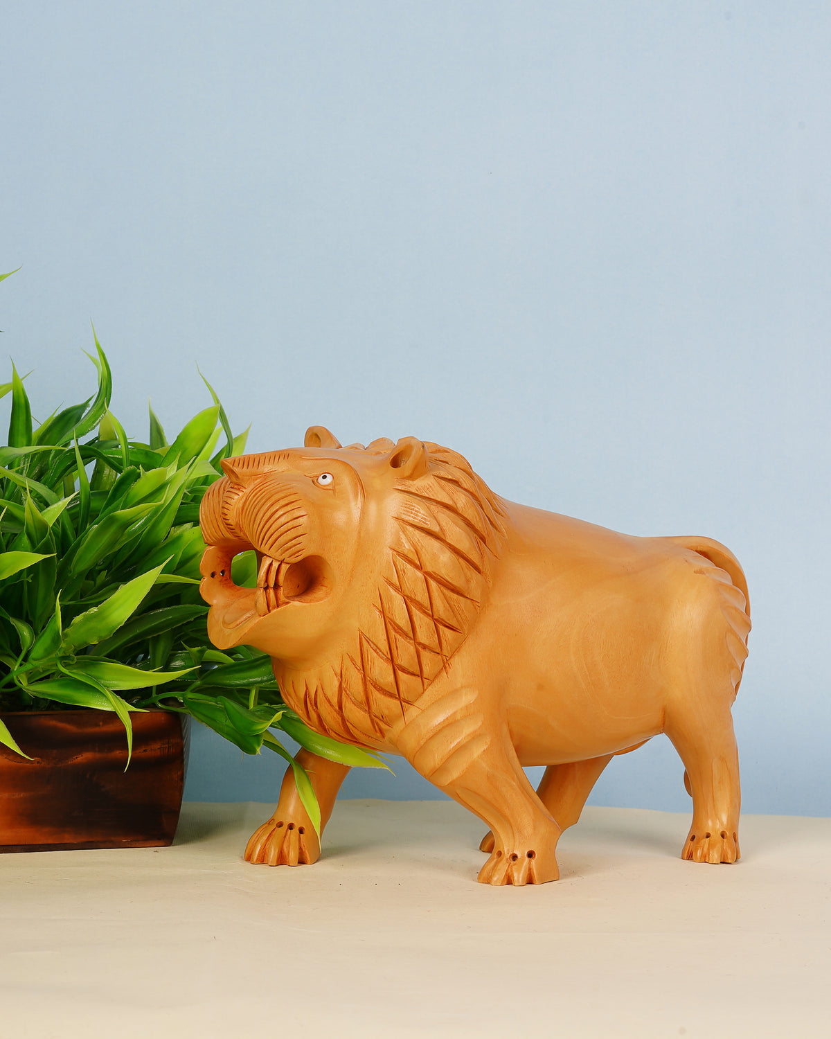 Kadam Wood Lion Statue — 3 inch, Brown